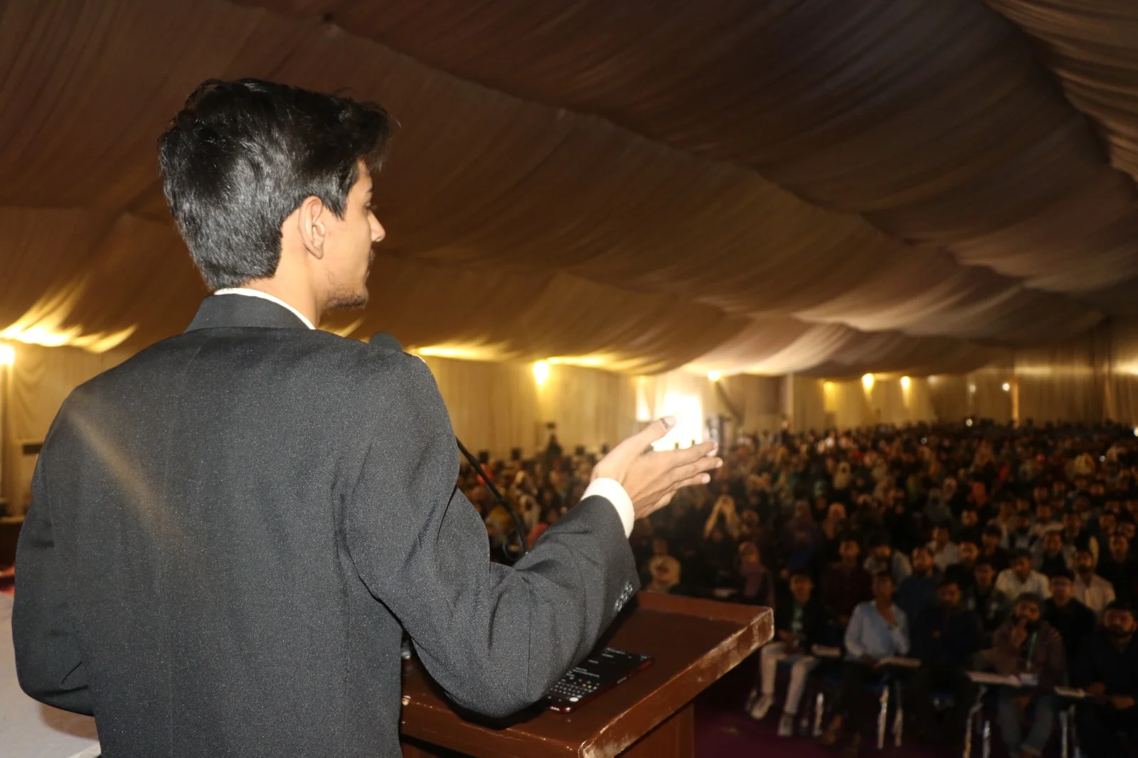 Hamzah teaching the AI engineering curriculum to a GIAIC cohort in Karachi.